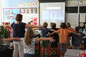 Students stretching in class